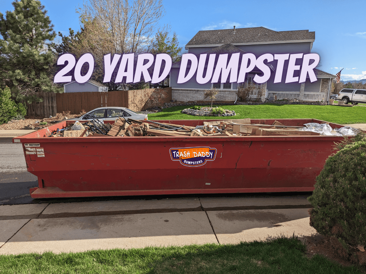 red 20 yard dumpster in the street